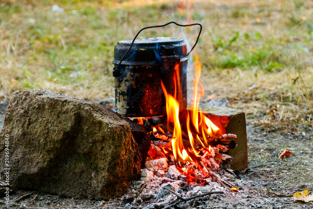 Cooking on campfire in camping