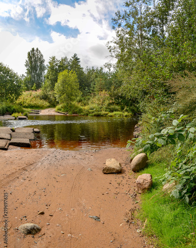 Summer morning on the banks of the river mga in the Leningrad region. photo