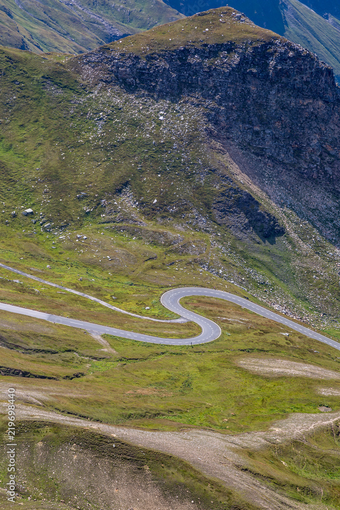 Fototapeta premium Alpine valley, high mountain roads