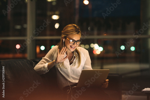 Woman on video call in office photo