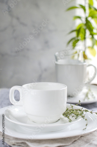Wallpaper Mural White plates, cup and glasses on the table Torontodigital.ca