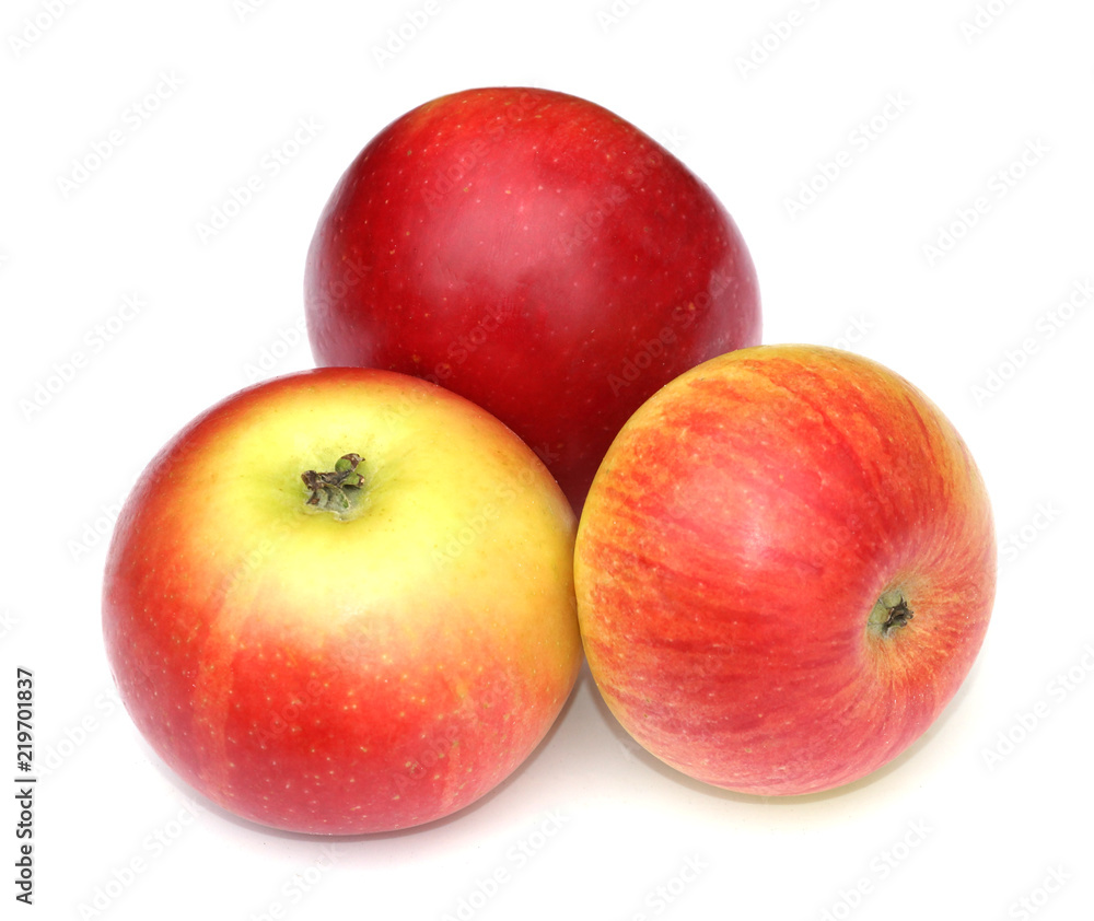 three red yellow red-yellow Apple isolate the white background. three red yellow red-yellow Apple isolate the white background.
