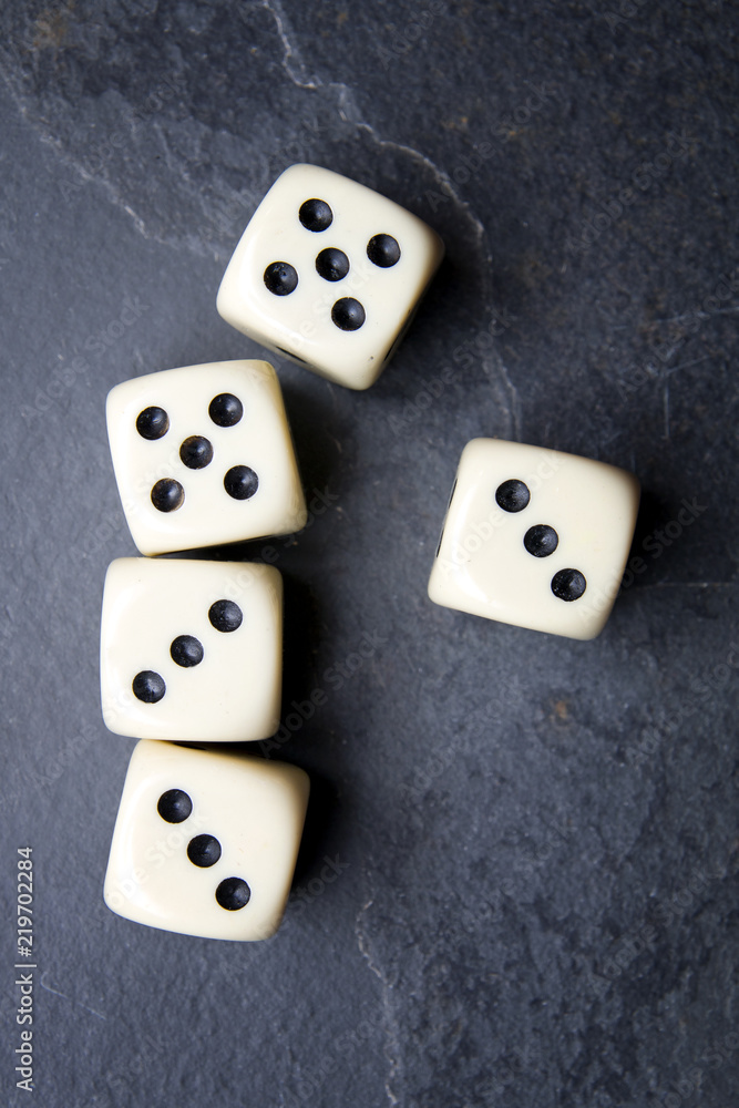 Dice for game on a black background. Full Three and a couple. Dice for game on a black background. Full Three and a couple.
