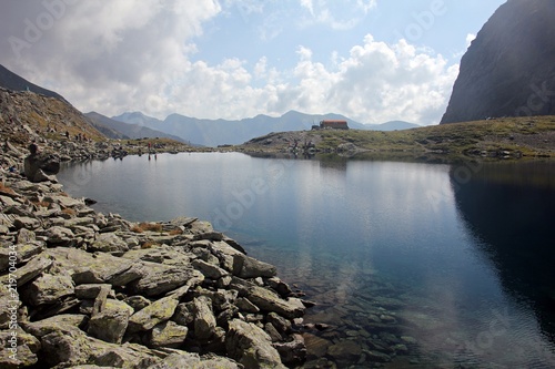 Glacial lake - sky reflection in the water photo