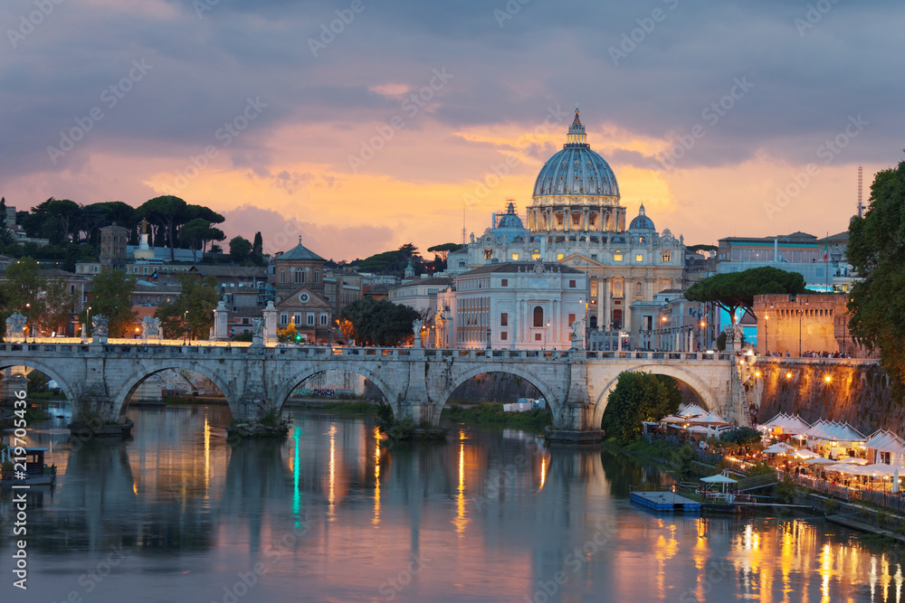 Night view to Ponte Sant'Angelo and Vaticano in Rome, Italy