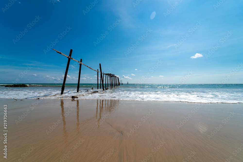 Old wooden bridge clear blue sky seascape beach