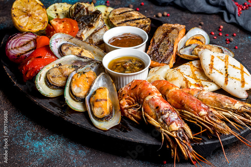 Fototapeta Seafood grilled on plate