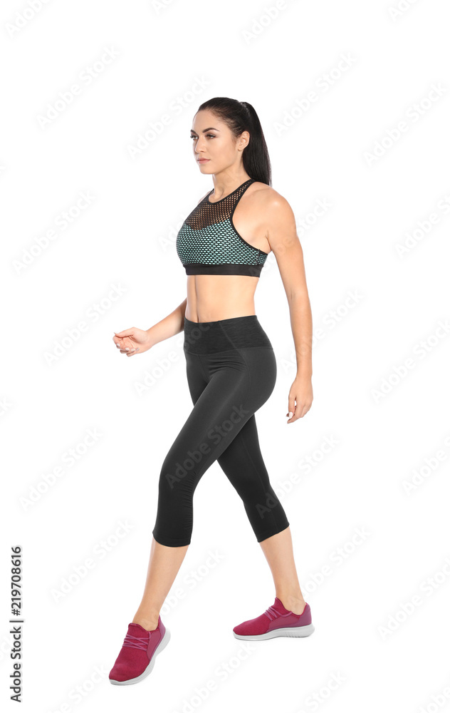 Sporty young woman running on white background Sporty young woman running on white background