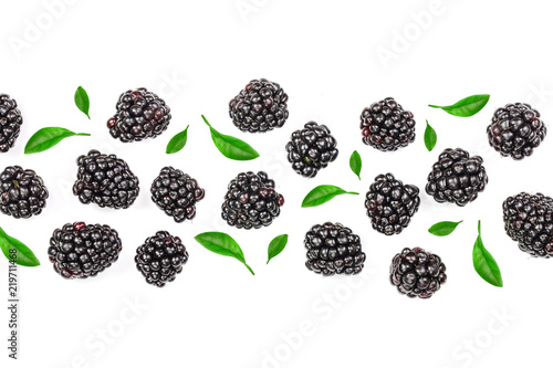 Fresh blackberry with leaves isolated on white background with copy space for your text. Top view. Flat lay pattern