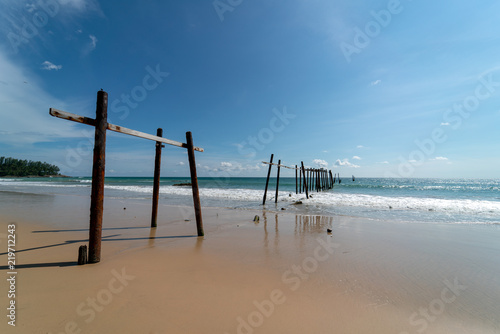 Old wooden bridge clear blue sky seascape beach