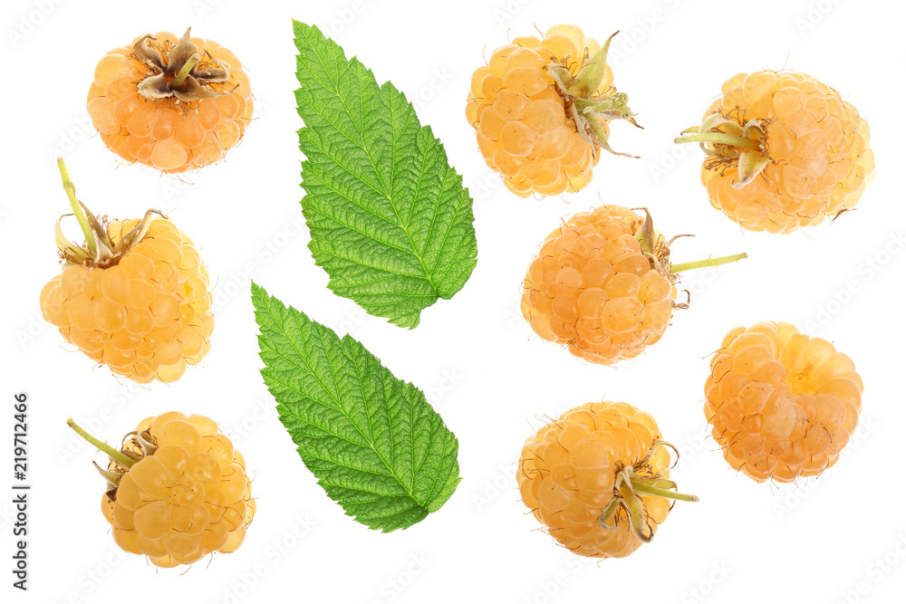 Yellow raspberries with leaf isolated on white background. Top view. Flat lay pattern Yellow raspberries with leaf isolated on white background. Top view. Flat lay pattern