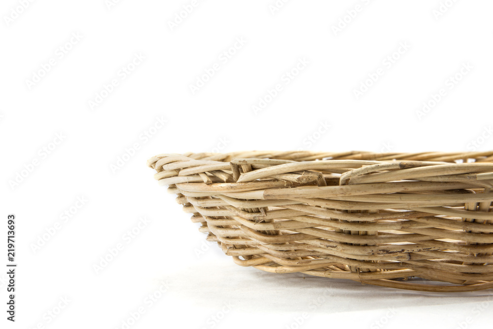 Fototapeta premium wicker basket on a white background