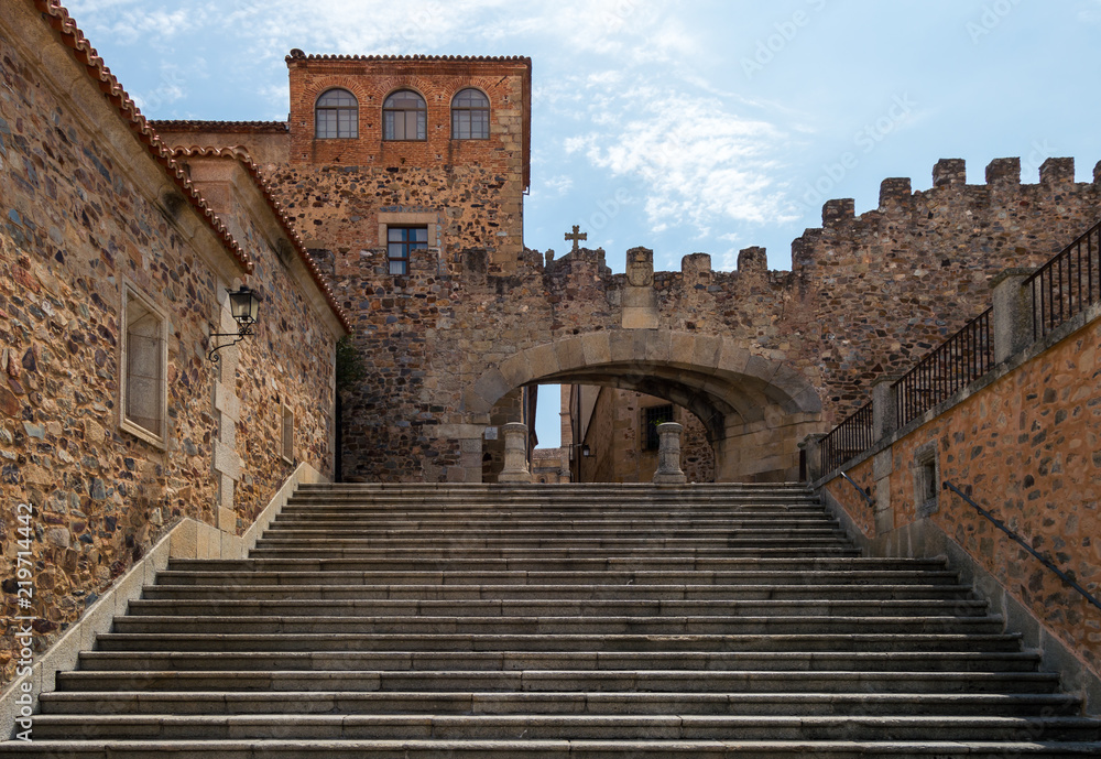 Arch of the Star (Arco de la estrella), main entrance through the wall to the main square located in medieval city of Caceres in Extremadura.