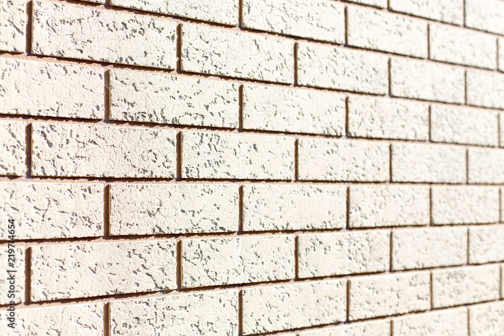 Rough wall texture, wall background, house facade with spatula technology. Close Rough wall texture, wall background, house facade with spatula technology. Close