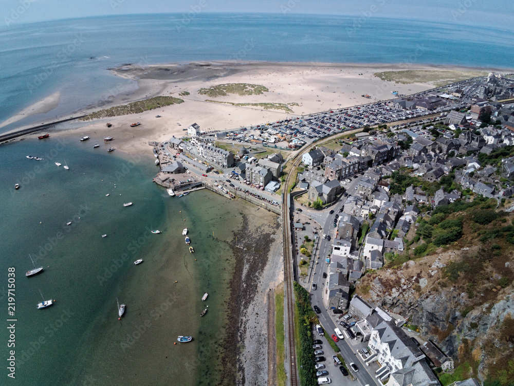 Aerial view, Drone panorama over sea, harbor, beach and old town of Barmouth, Wales