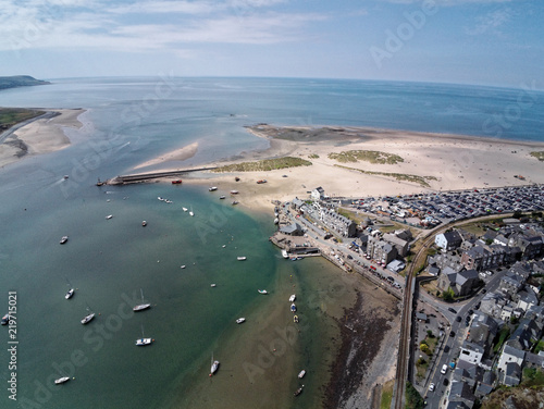 Aerial view, Drone panorama over sea, harbor, beach and old city of Barmouth, Wales