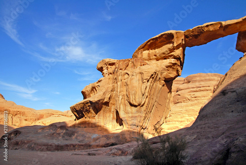 Natural rock arch in Wadi Rum Jordan