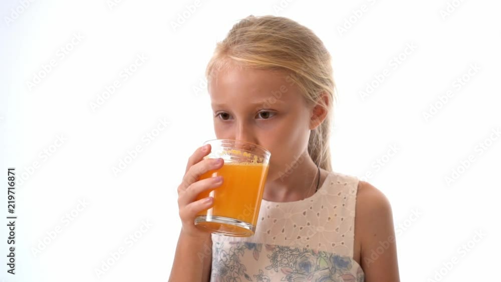 Happy kid drinking fresh juice Happy kid drinking fresh juice