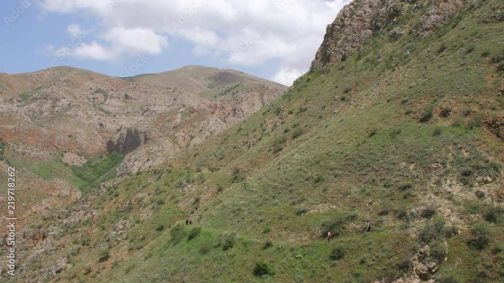Tourist walking in Amaghu Valley around the Noravank Monastery, Armenia 5 Tourist walking in Amaghu Valley around the Noravank Monastery, Armenia 5