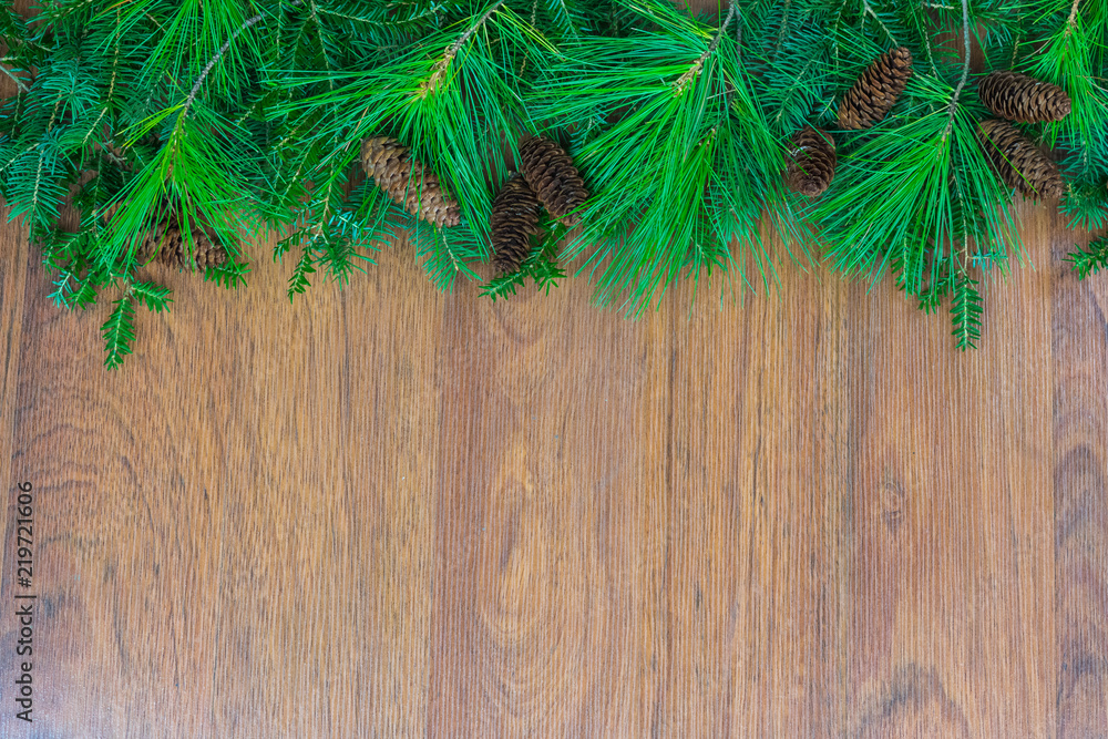 A top border of greenery with pine cones A top border of greenery with pine cones