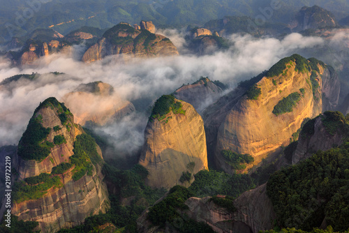 Bajiaozhai National Forest Park in Ziyuan County, Guangxi Province China. Longtouxiang Area. UNESCO World Heritage. Sea of Clouds, Fog and Mist floating between the Danxia Landforms, Aerial View 八角寨 photo