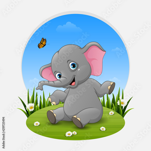 Cartoon baby elephant posing on the grass