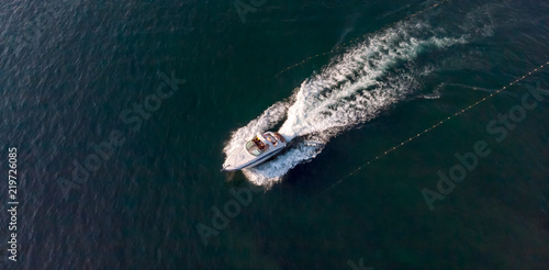 Top view of a white motor boat © Логофеди Дмитрий