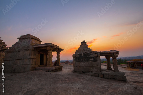 Sunset at Hemakuta hill, Hampi. Hampi, capital of the Vijayanagara empire, sits on the banks of the Tungabhadra River.