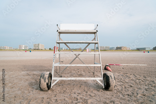 Empty Lifeguard Stand At Wildwood New Jersey Shore Beach with Hotels for Vacation in Background