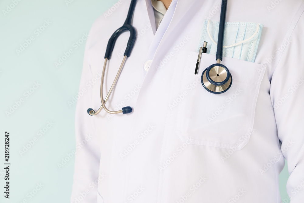 Doctor in white gown uniform with stethoscope in a hospitsl. Doctor in white gown uniform with stethoscope in a hospitsl.