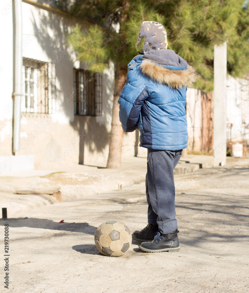 children play ball on the street children play ball on the street