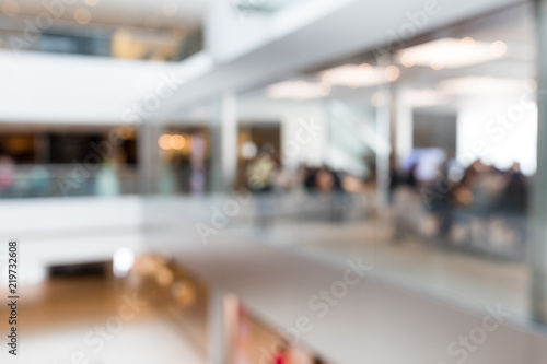Blur of shopping department store © leungchopan