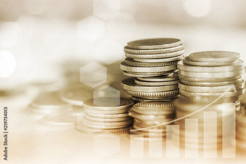 Stack of coins with growing graph for business finance concept Stack of coins with growing graph for business finance concept