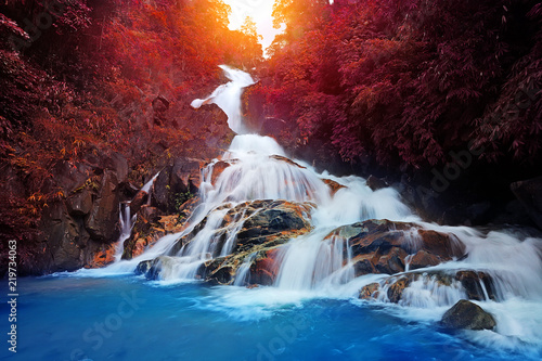 Waterfall in deep rain forest jungle at Khao Khitchakut Waterfall in Chanthaburi Province, Eastern of Thailand photo