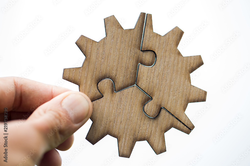 puzzle in hand isolated on white,Business Ideas puzzle in hand isolated on white,Business Ideas