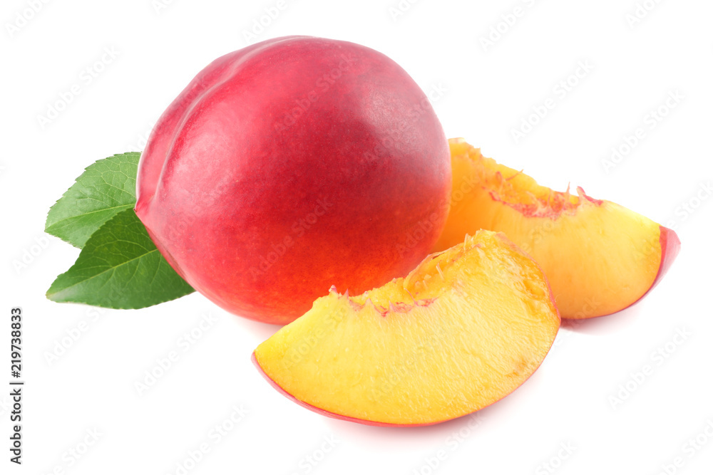 Nectarine with green leaf and slices isolated on white background. Nectarine with green leaf and slices isolated on white background.