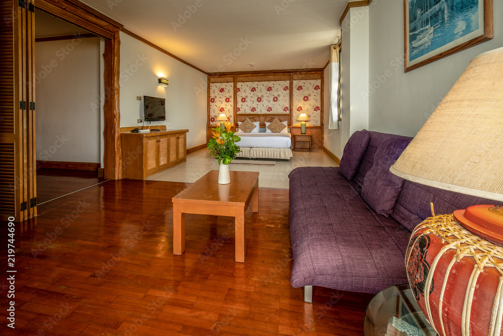 Fototapeta premium interia perspective of executive suite hotel bedroom with one bedroom and a separate living space at Rayong Chalet Rayong district Thailand