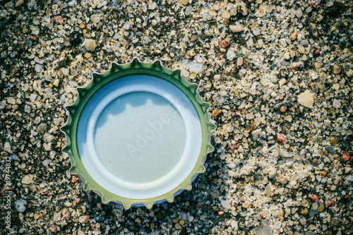Background texture of nature rock and bottle cap.