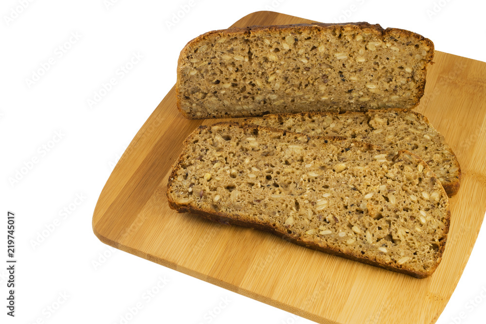 Sliced rye bread on cutting board. Whole grain rye bread with seeds. Delicious whole grain bread. Sliced rye bread on cutting board. Whole grain rye bread with seeds. Delicious whole grain bread.
