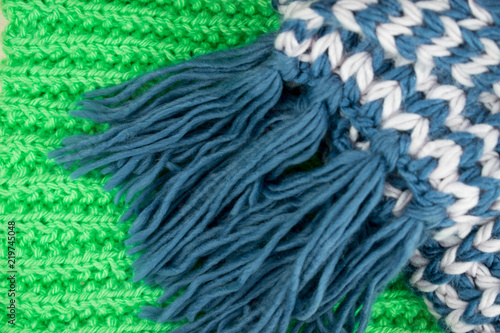Two types of knitted fabric: green and blue-white.