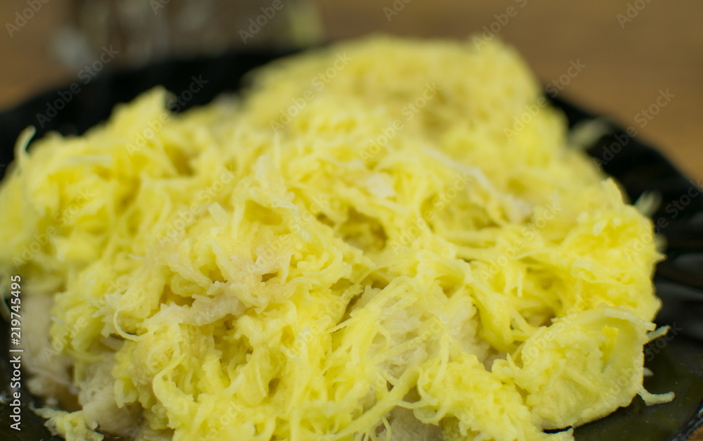 Grated potato on a grater. For cooking dishes from potatoes. Grated potato on a grater. For cooking dishes from potatoes.