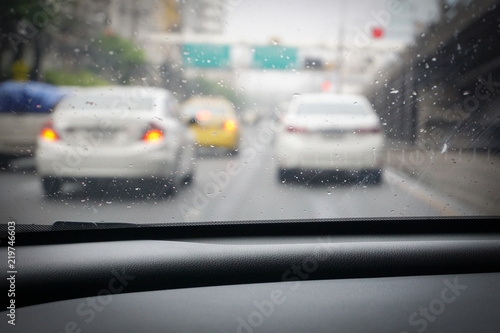 Driving from the driver's perspective in the rain. © Anusorn