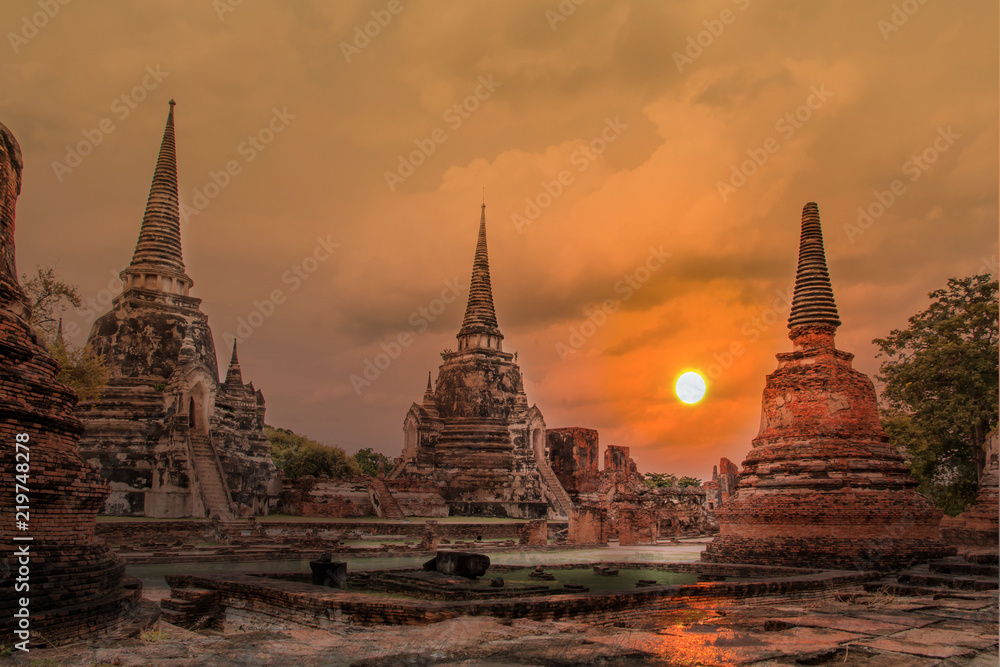 Double exposure sculpture Landscape of Ancient old pagoda is Famous Landmark old History Buddhist temple,Beautiful Wat Chai Watthanaram temple in ayutthaya Thailand