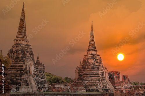 Double exposure sculpture Landscape of Ancient old pagoda is Famous Landmark old History Buddhist temple,Beautiful Wat Chai Watthanaram temple in ayutthaya Thailand