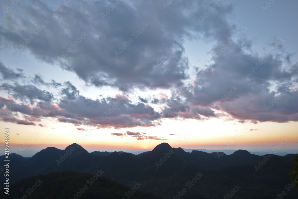 A beautiful sunset sky with silhouette mountain A beautiful sunset sky with silhouette mountain