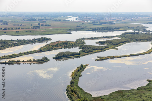 Aerial view estuary Dutch river IJssel with small islands and wetlands in lake Ketelmeer photo