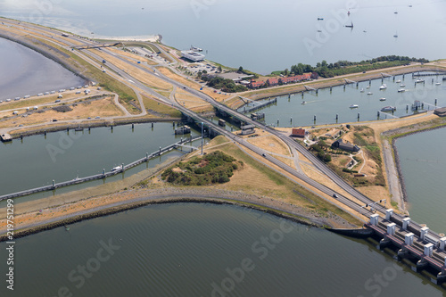 Aerial view Dutch sluices of Kornwerderzand, separation between the fresh water lake IJsselmeer and the salt Wadden Sea