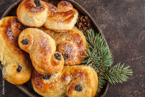 Traditional Swedish Christmas saffron buns (lussebulle or lussekatt). Swedish christmas.