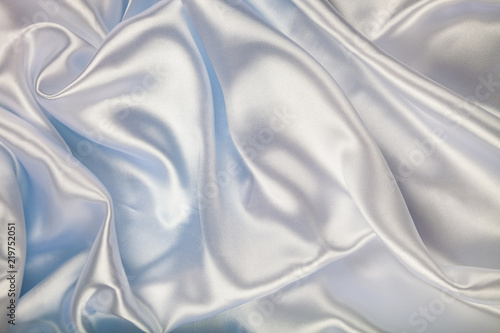 White silk fabric with folds.