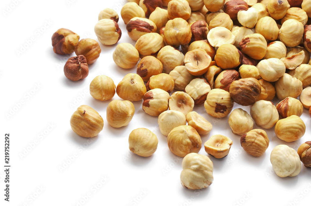 Hazelnuts roasted peeled isolated on white Hazelnuts roasted peeled isolated on white